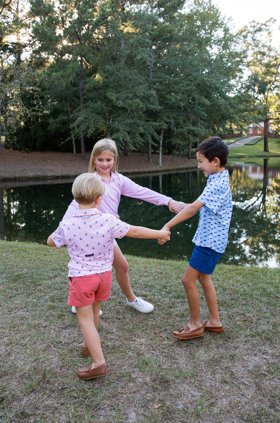 Short Sleeve Pro Performance Polo | Fishing Boat Print on Spiced Coral Stripe