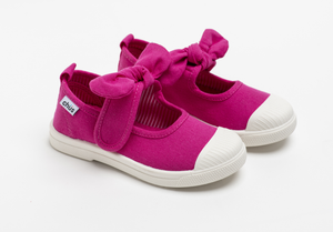 Canvas sneakers with single velcro strap and removable bow tie in fuchsia / hot pink. Adorable monogrammed. Chus Shoes.
