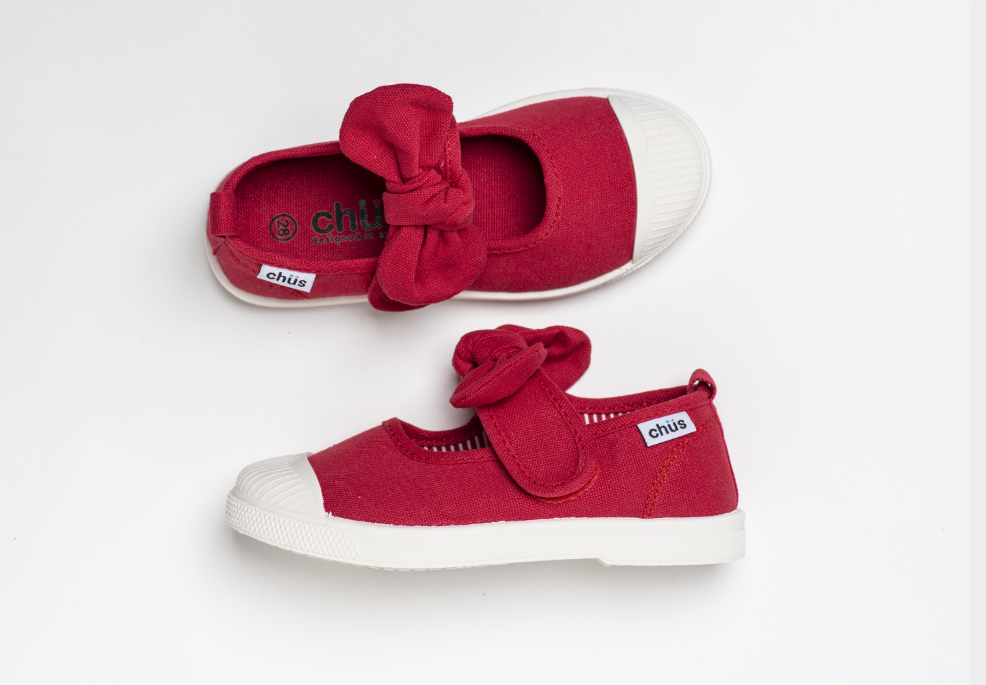 Canvas sneakers with single velcro strap and removable bow tie in red. Adorable monogrammed. Chus Shoes. Top view.