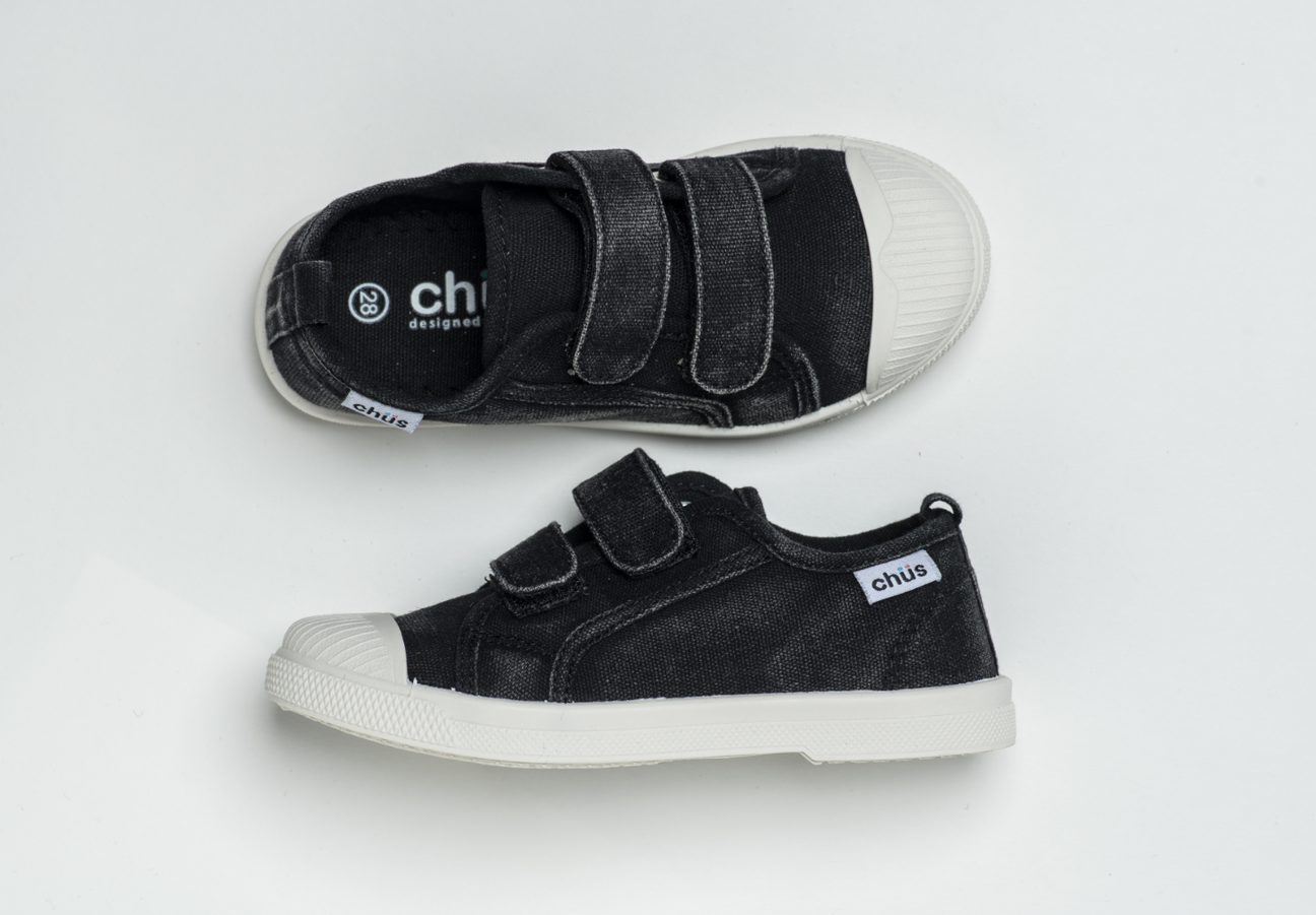 Distressed black canvas sneakers with double velcro straps. Chus Shoes. Top view.