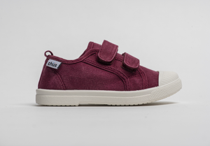 Distressed maroon canvas sneakers with double velcro straps. Chus Shoes. Side view.