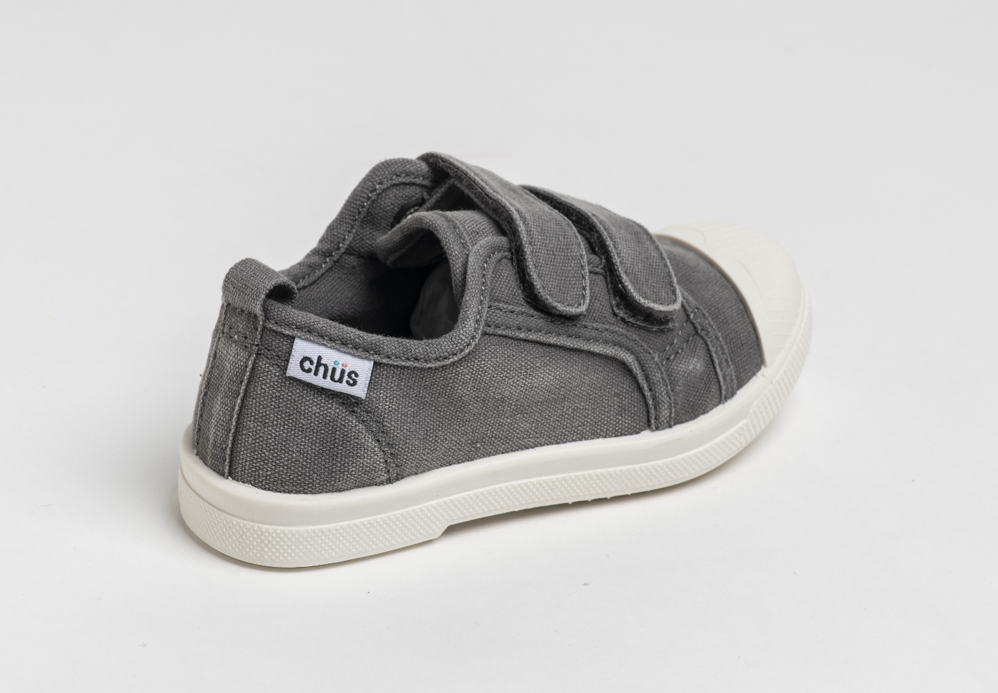 Distressed grey canvas sneakers with double velcro straps. Chus Shoes. Back View.