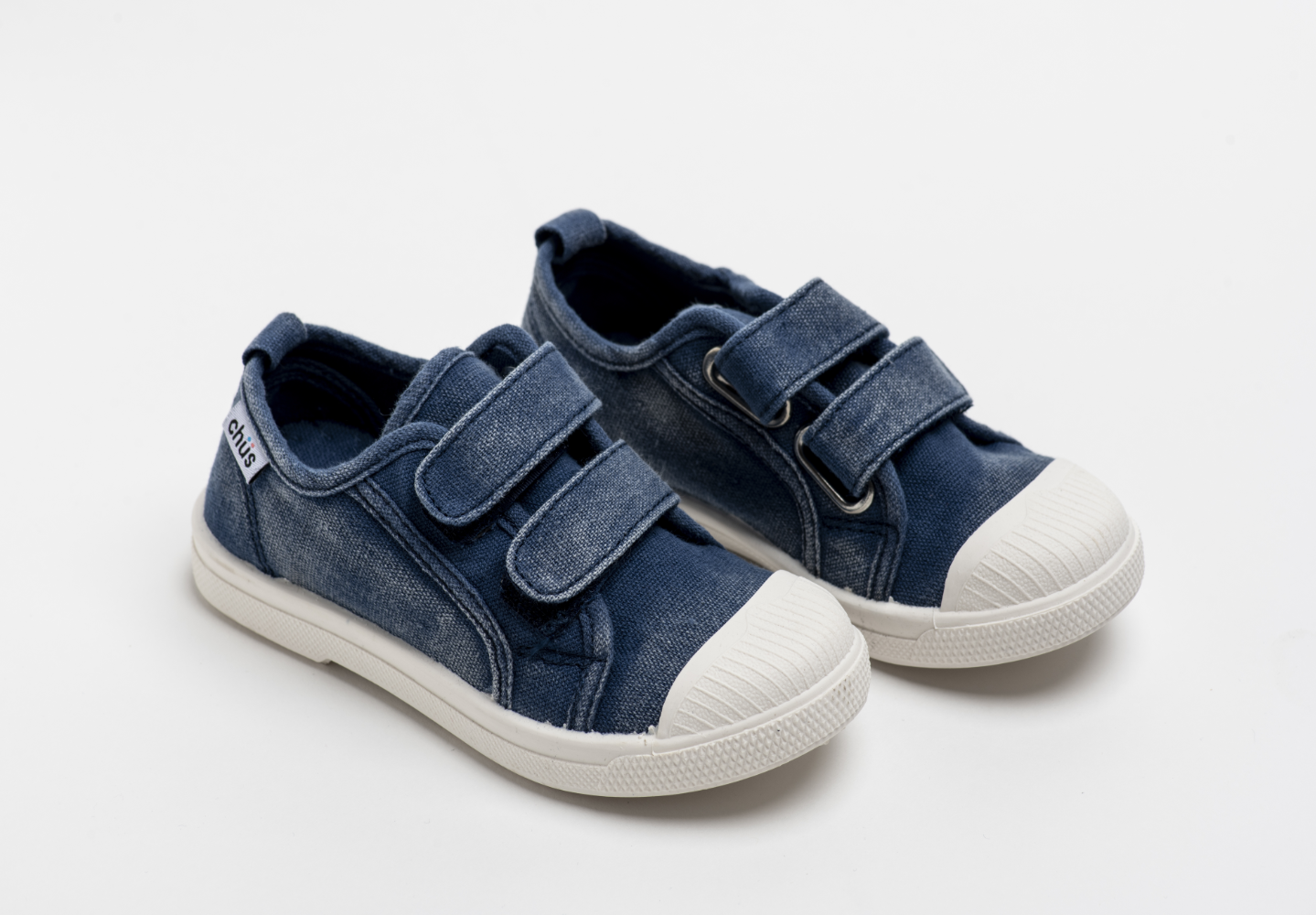 Distressed navy canvas sneakers with double velcro straps. Chus Shoes.