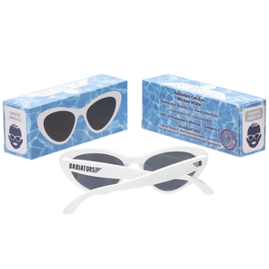 Cat eye shaped baby and toddler sunglasses -- in "wicked white". 100% UVA and UVB protection. Babiators. Packaging